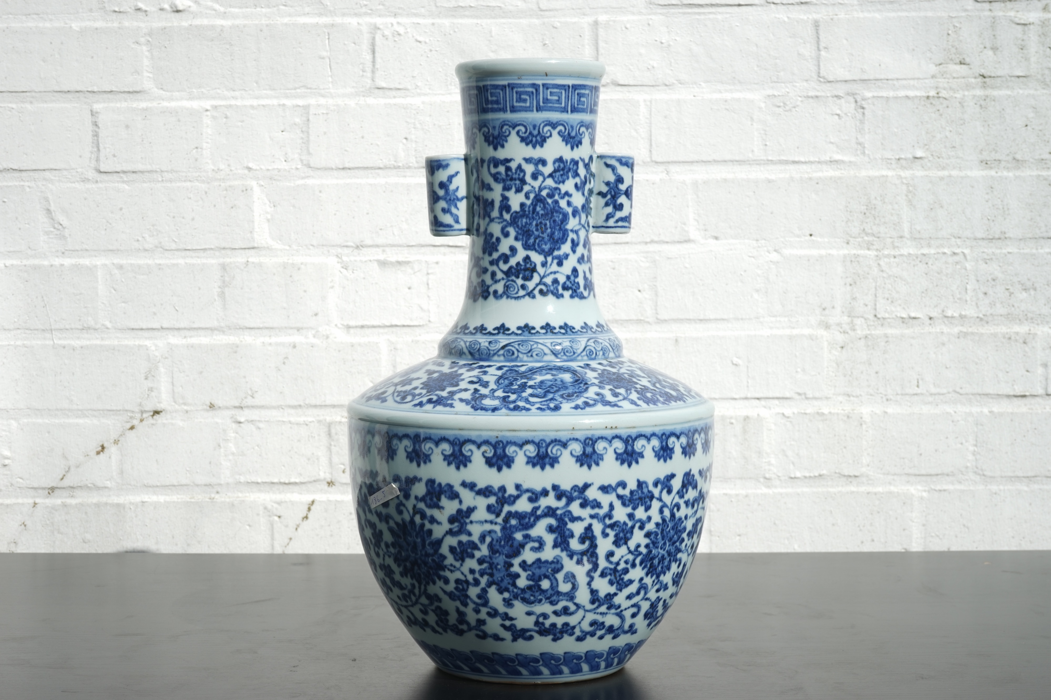 A Chinese Blue And White Ming Style Porcelain Arrow Vase With Lotus