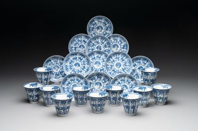 11 Japanese blue and white cups and 12 saucers with floral design, Chenghua mark, Meiji, 19th C.