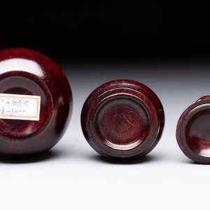 12 various Chinese carved huali and hongmu fruit-form covered boxes, 20th C. — photo 24