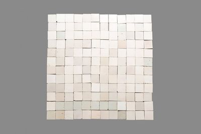 144 plain white Dutch Delft tiles, so called 'witjes', 18/19th C.