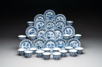 18 Chinese blue and white cups and 16 saucers with floral design, jade mark, Kangxi