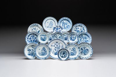 18 Chinese blue and white plates and saucers with floral design, 18th C.