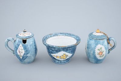 2 Brussels faience blue ground mustard jugs and a bowl, 18th C.