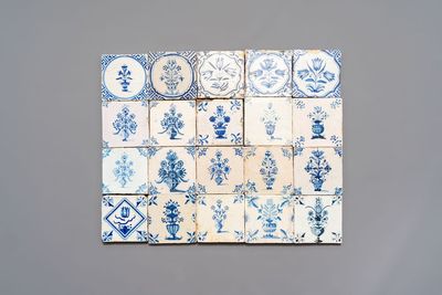 20 blue and white Dutch Delft tiles with floral design, 17th C.