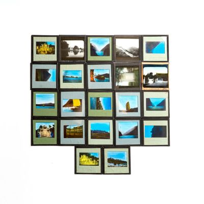22 hand-coloured glass magic lantern slides depicting views of China, inscribed 'Maison Provinciale, Chala, Chine', early 20th C.