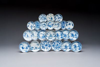 23 Chinese blue and white saucers with figural design, Yongzheng/Kangxi