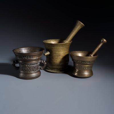 Three bronze mortars and two pestles, The Netherlands, dated 1627/1662 and 17th C.