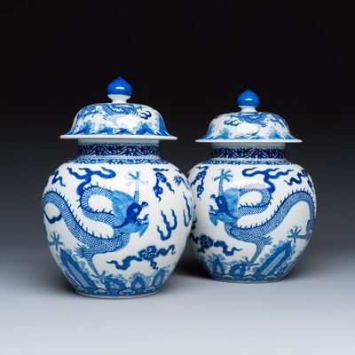 A pair of Chinese blue and white 'Dragon' jars and covers, Jiajing mark, 19th C.