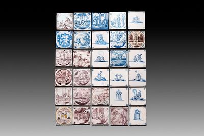 30 blue, white and manganese Dutch Delft 'biblical subject' tiles, 17/19th C.