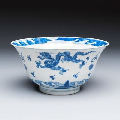 A Chinese blue and white 'Dragons and Leaping Carp' bowl, Kangxi