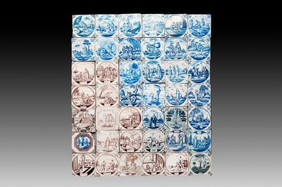 42 blue, white and manganese Dutch Delft 'biblical subject' tiles, 18/19th C.