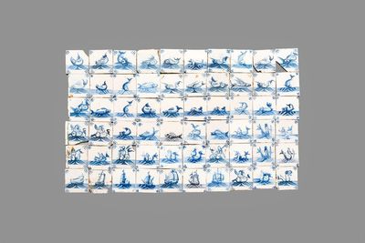 60 blue and white Dutch Delft 'Sea Creatures' and 'Ship' tiles, 18th C.