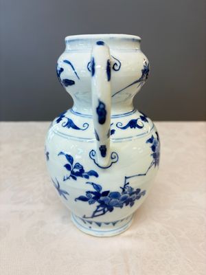 A Chinese blue and white double-handled vase with floral design — photo 6