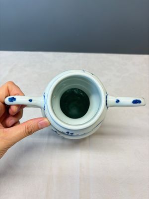 A Chinese blue and white double-handled vase with floral design — photo 9