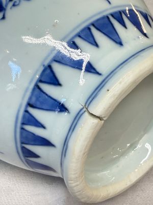 A Chinese blue and white double-handled vase with floral design — photo 12