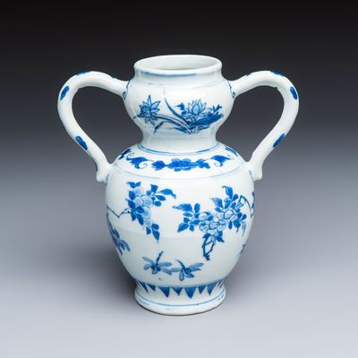 A Chinese blue and white double-handled vase with floral design, Transitional period