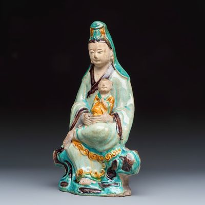 A Chinese Fahua-glazed stoneware 'Guanyin and Child' group, Ming