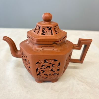 A Chinese Yixing stoneware openworked double-walled teapot and cover with floral design — photo 1