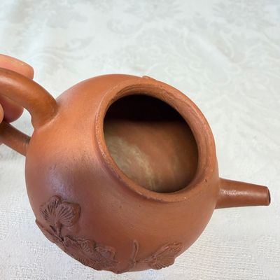 A Chinese Yixing stoneware teapot and cover with floral relief design — photo 7