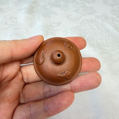 A Chinese Yixing stoneware teapot and cover with floral relief design — photo 9