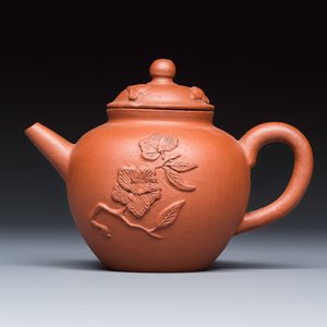 A Chinese Yixing stoneware teapot and cover with floral relief design — photo 2