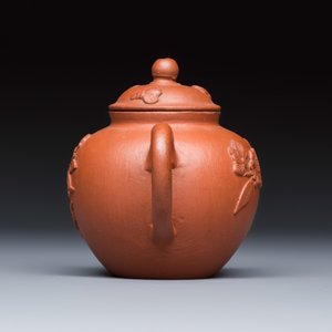 A Chinese Yixing stoneware teapot and cover with floral relief design — photo 3