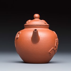 A Chinese Yixing stoneware teapot and cover with floral relief design — photo 5