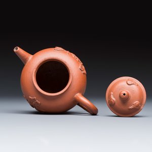 A Chinese Yixing stoneware teapot and cover with floral relief design — photo 6