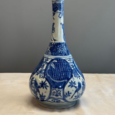 A Chinese blue and white 'Bird among Flowering Branches' bottle vase — photo 1