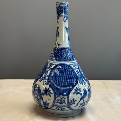 A Chinese blue and white 'Bird among Flowering Branches' bottle vase — photo 2