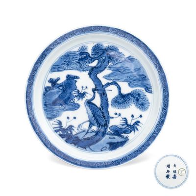  A Chinese blue and white 'Crane' saucer dish, Jiajing mark and of the period