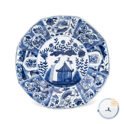 A Chinese blue and white 'Cuckoo in the House' plate, jade mark, Kangxi