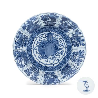 A Chinese blue and white 'Double Gourd' plate, Egret mark, Wanli