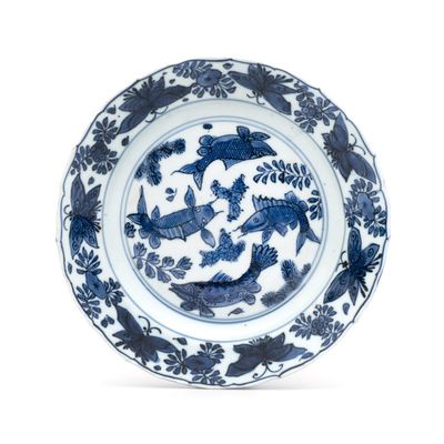 A Chinese blue and white 'Fish and Butterflies' plate, Wanli