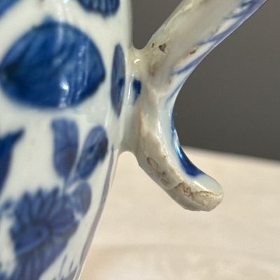 A Chinese blue and white 'Flowers and Auspicious Emblems' ewer — photo 11