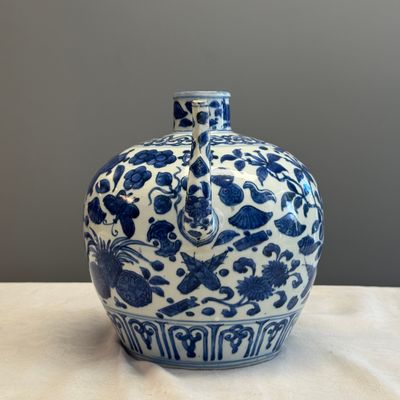 A Chinese blue and white 'Flowers and Auspicious Emblems' ewer — photo 12