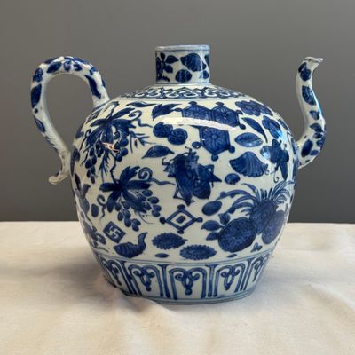 A Chinese blue and white 'Flowers and Auspicious Emblems' ewer — photo 7