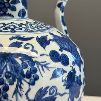 A Chinese blue and white 'Flowers and Auspicious Emblems' ewer — photo 9