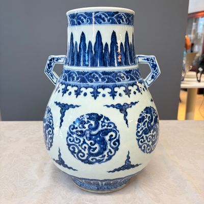 A Chinese blue and white 'Hu' vase with phoenix medallions — photo 10