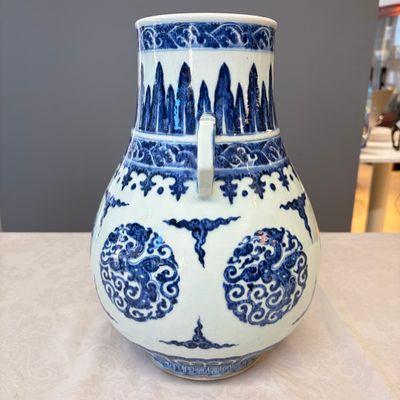A Chinese blue and white 'Hu' vase with phoenix medallions — photo 15