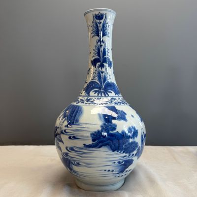 A Chinese blue and white 'Jiao You Dian Hua 郊遊点化' bottle vase — photo 1