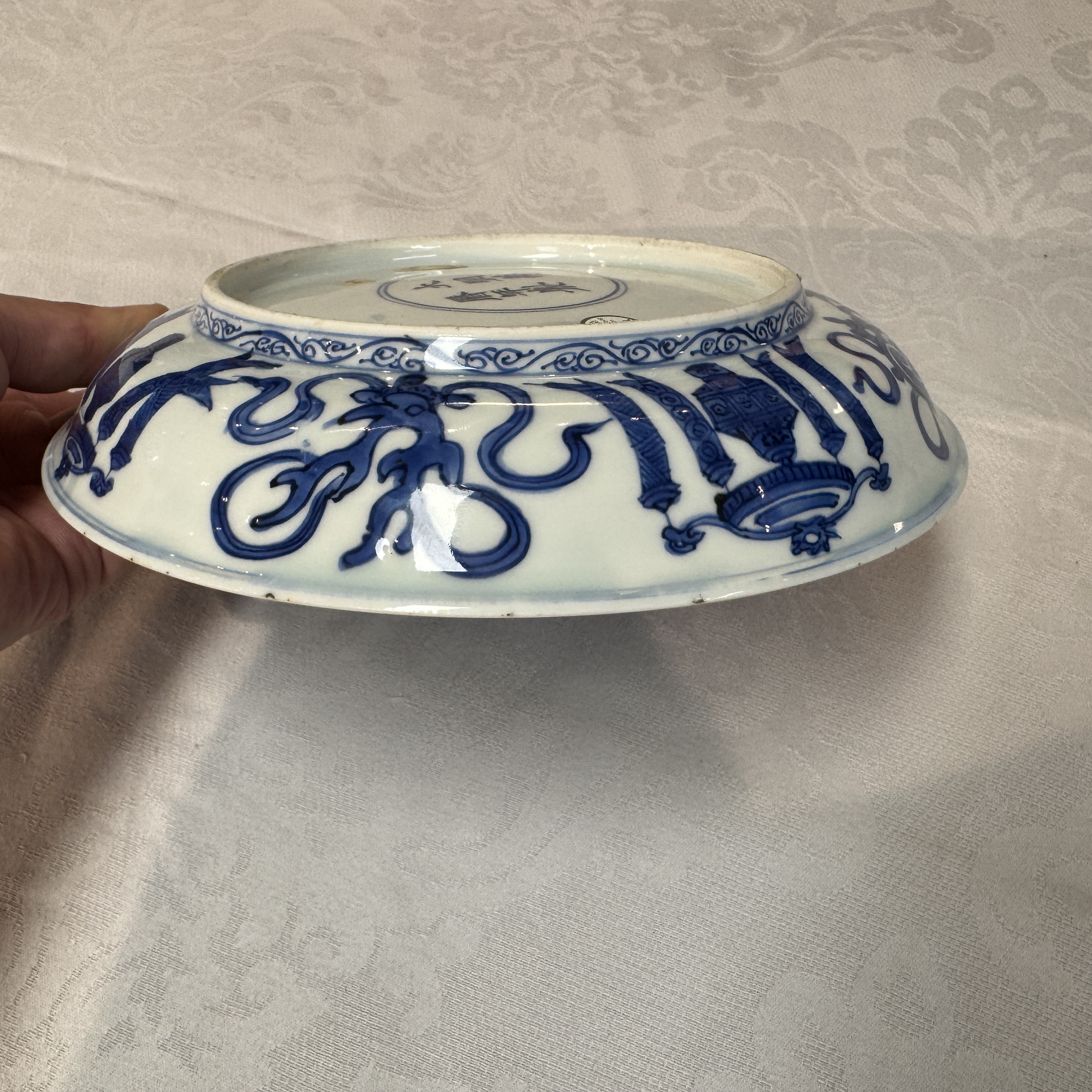 A Chinese blue and white 'Sage and Crane' plate — photo 24
