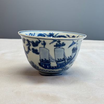 A Chinese blue and white 'Ship Before a City Gate' bowl — photo 1