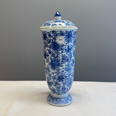 A Chinese blue and white beaker and cover with floral design — photo 1