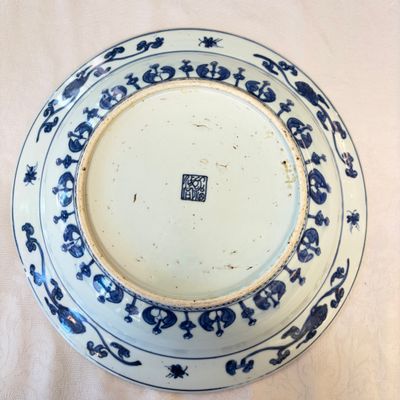 A Chinese blue and white dish with floral design — photo 12