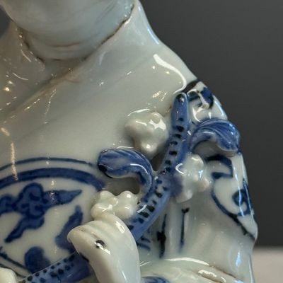 A Chinese blue and white figure of the immortal He Xiangu — photo 17