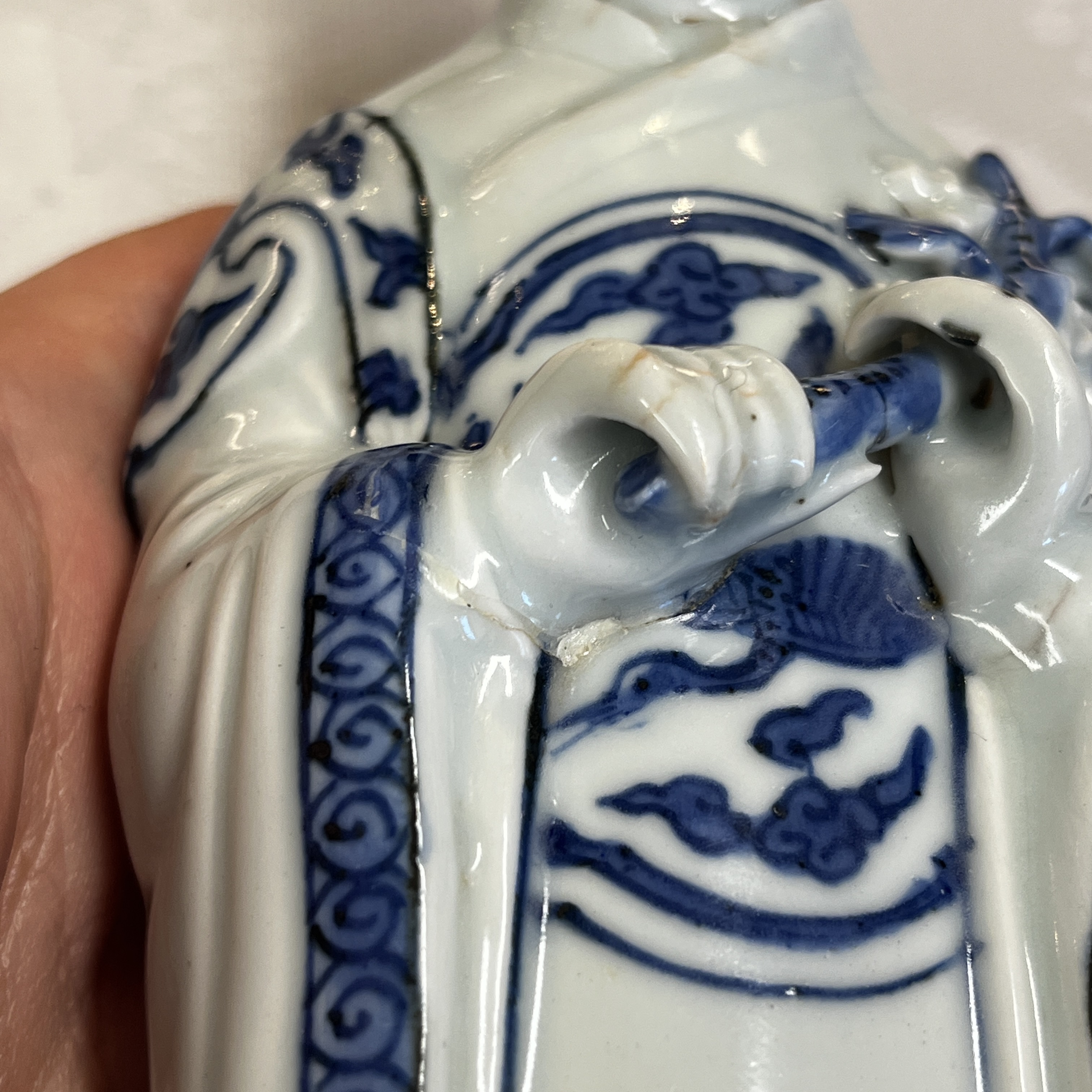 A Chinese blue and white figure of the immortal He Xiangu — photo 21