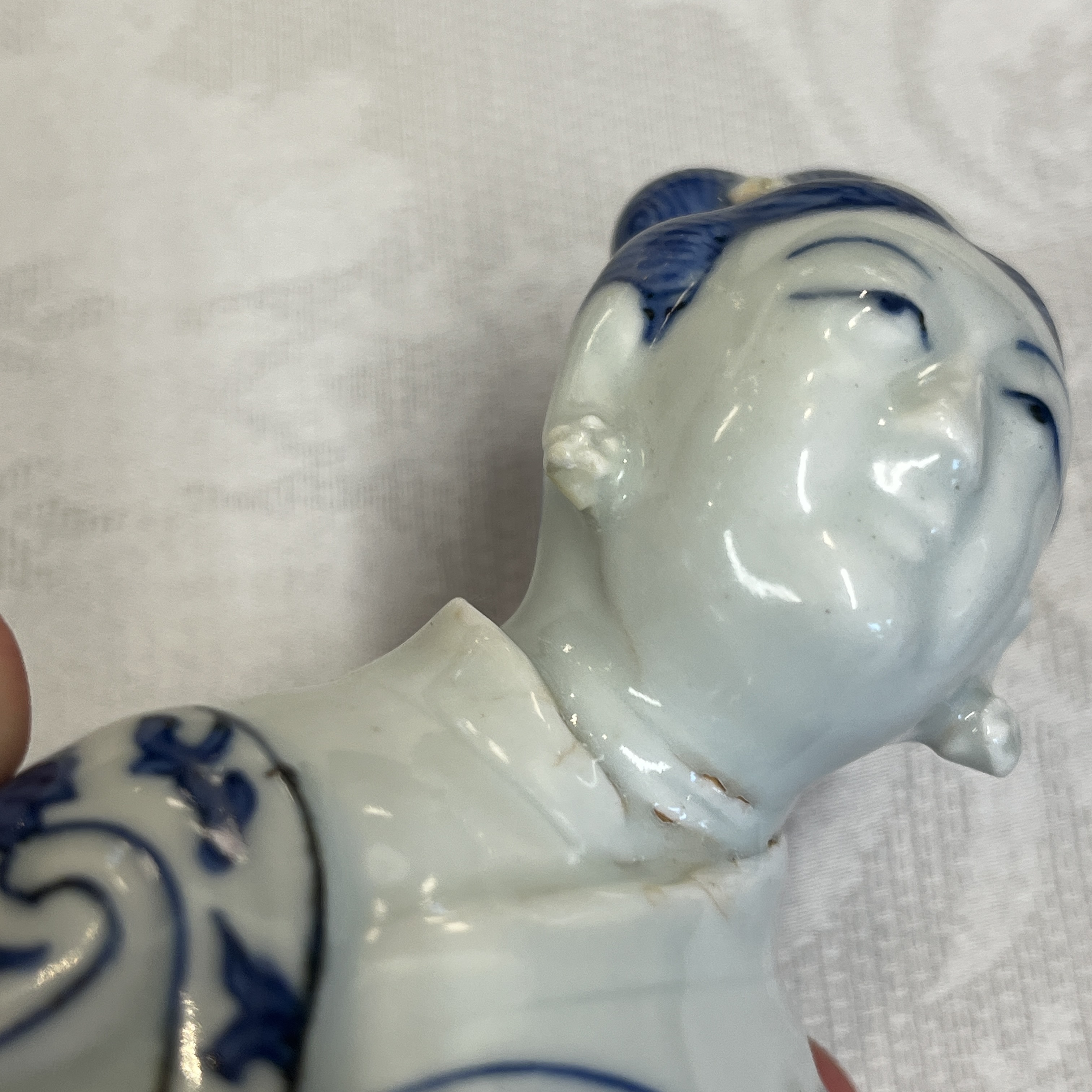 A Chinese blue and white figure of the immortal He Xiangu — photo 22