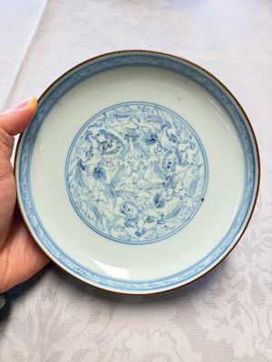 A Chinese blue and white pencil-style 'Buddhist Lions' plate — photo 1