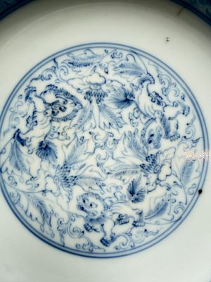 A Chinese blue and white pencil-style 'Buddhist Lions' plate — photo 2